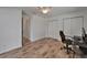 Bright and airy bedroom featuring vinyl flooring, a ceiling fan, and large closet space at 6334 Cocoa Ln, Apollo Beach, FL 33572