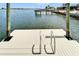 Close up view of the boat dock with ladder at 6334 Cocoa Ln, Apollo Beach, FL 33572