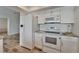 Bright kitchen featuring modern appliances and ample counter space at 6334 Cocoa Ln, Apollo Beach, FL 33572