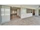 Covered patio featuring seamless access to the pool and waterfront views at 6334 Cocoa Ln, Apollo Beach, FL 33572