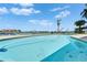 Backyard pool with blue sky and waterfront views at 6334 Cocoa Ln, Apollo Beach, FL 33572