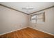 A comfortable bedroom with a ceiling fan and a window for natural light at 6530 68Th N St, Pinellas Park, FL 33781