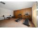 Exercise room includes weights and treadmills for home workouts at 6530 68Th N St, Pinellas Park, FL 33781