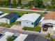 Aerial shot of a single-Gathering home with well-maintained lawns and nearby highway access at 8443 Fantasia Park Way, Riverview, FL 33578