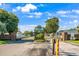 Community entrance features signage, gated access, and manicured landscaping at 8443 Fantasia Park Way, Riverview, FL 33578