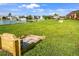 Horseshoe pit and lake in community at 8443 Fantasia Park Way, Riverview, FL 33578