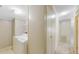 Laundry room with washer, dryer, and storage along hall at 8443 Fantasia Park Way, Riverview, FL 33578