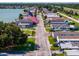 A view down the street in the community showing tidy lawns and various single-Gathering homes at 8443 Fantasia Park Way, Riverview, FL 33578
