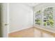 Bright bedroom with large windows and vinyl floor at 10203 Shadow Branch Dr, Tampa, FL 33647