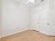 Bedroom featuring ceiling fan and two white doors at 10203 Shadow Branch Dr, Tampa, FL 33647
