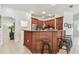 Well-appointed kitchen area with a large breakfast bar and ample storage space at 10203 Shadow Branch Dr, Tampa, FL 33647