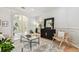 Beautifully decorated living room showcasing stylish furnishings and plenty of natural light at 10203 Shadow Branch Dr, Tampa, FL 33647