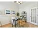 Bright office space with large windows, hardwood floors, and neutral wall color at 10203 Shadow Branch Dr, Tampa, FL 33647