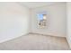 This bedroom features carpet and natural light from the window at 10426 Cross River Trl, Parrish, FL 34219