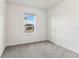 This carpeted bedroom features a window that lets in natural light at 10426 Cross River Trl, Parrish, FL 34219