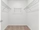 This walk-in closet features wire shelving at 10426 Cross River Trl, Parrish, FL 34219