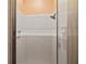 A recently updated tiled shower with glass door at 1109 Pinellas Bayway S # 306, Tierra Verde, FL 33715