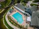Aerial view of the community pool and amenities, showcasing the attractive outdoor spaces at 1115 Ashbourne Cir, Trinity, FL 34655
