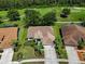 Scenic aerial shot highlighting the home's manicured landscaping and serene golf course backdrop at 1115 Ashbourne Cir, Trinity, FL 34655