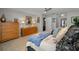 Comfortable bedroom features nice decor, lots of light, a ceiling fan and neutral colored walls at 1115 Ashbourne Cir, Trinity, FL 34655