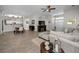 Open-concept living area seamlessly connects the kitchen, dining, and living spaces for effortless entertaining at 1115 Ashbourne Cir, Trinity, FL 34655