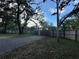 View of backyard and gated access at 12009 Washington St, Seffner, FL 33584