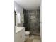 Modern bathroom with tiled shower and updated vanity at 12009 Washington St, Seffner, FL 33584