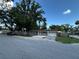 Charming single-story home with a lush green yard and a private driveway at 12009 Washington St, Seffner, FL 33584