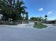 Inviting single-story home with lush landscaping and a spacious driveway at 12009 Washington St, Seffner, FL 33584