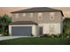 Charming two-story home with a gray garage door, neutral stucco, horizontal siding, and a well-manicured lawn at 12824 Wanderlust Pl, Parrish, FL 34219