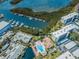 Aerial view of condos, pool and spa, shuffleboard and marina at 1324 Pasadena S Ave # 501, South Pasadena, FL 33707