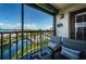 The screened balcony offers stunning water views, creating a serene outdoor living space at 1324 Pasadena S Ave # 501, South Pasadena, FL 33707