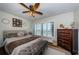 Comfortable bedroom featuring soft natural light and stylish decor at 1324 Pasadena S Ave # 501, South Pasadena, FL 33707