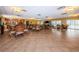 Enjoy the open layout of this common room, featuring multiple seating areas and a kitchenette at 1324 Pasadena S Ave # 501, South Pasadena, FL 33707