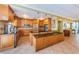 This kitchen is well-equipped with stainless steel appliances and granite countertops for cooking and gathering at 1324 Pasadena S Ave # 501, South Pasadena, FL 33707