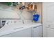 Convenient laundry area features modern appliances and ample storage space at 1324 Pasadena S Ave # 501, South Pasadena, FL 33707