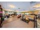 Inviting lounge area with comfortable seating, billiards and views at 1324 Pasadena S Ave # 501, South Pasadena, FL 33707