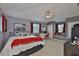 Spacious bedroom featuring gray walls, carpet flooring, a ceiling fan, a window seat, and a workspace at 13728 Artesa Bell Dr, Riverview, FL 33579