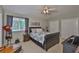 Comfortable bedroom with neutral walls and a ceiling fan, providing a serene retreat at 13728 Artesa Bell Dr, Riverview, FL 33579