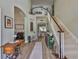 Elegant foyer showcasing a staircase and beautiful decor at 13728 Artesa Bell Dr, Riverview, FL 33579