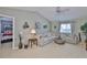 Bright living room features vaulted ceilings, neutral tones, and comfortable seating, creating a relaxing atmosphere at 13728 Artesa Bell Dr, Riverview, FL 33579