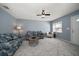 Cozy living room showcasing plush seating, neutral tones, and inviting atmosphere at 15623 Morgan St, Clearwater, FL 33760