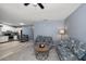 Open living space with a view into the kitchen, ideal for entertaining and relaxing at 15623 Morgan St, Clearwater, FL 33760