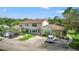 Spacious two-story home with ample parking, mature trees, and inviting curb appeal at 15636 Morning Dr, Lutz, FL 33559