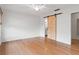 Bright and airy main bedroom featuring hardwood floors and an en-suite bathroom at 15636 Morning Dr, Lutz, FL 33559