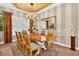 Dining room with large table, decor, and chandelier at 15744 Crystal Waters Dr, Wimauma, FL 33598