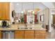 Kitchen sink area overlooking the dining and living areas at 15744 Crystal Waters Dr, Wimauma, FL 33598
