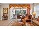 Relaxing screened lanai provides a tranquil outdoor space with comfortable seating, perfect for enjoying the serene surroundings at 15744 Crystal Waters Dr, Wimauma, FL 33598