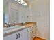 Neutral bathroom with plenty of light, storage, and a classic design at 2417 Locksley St # 229, Sun City Center, FL 33573
