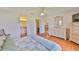 Bedroom with en suite bathroom, walk in closet, and a connected bedroom in a neutral color palette at 2417 Locksley St # 229, Sun City Center, FL 33573